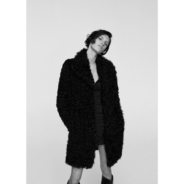 Manteau fausse fourrure revers femme